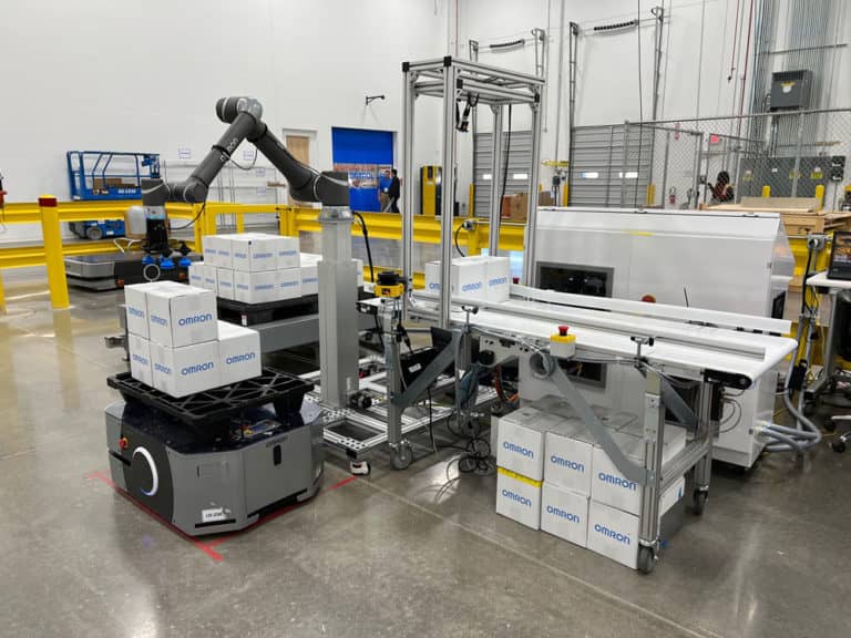 TM Robot stacking boxes on pallet